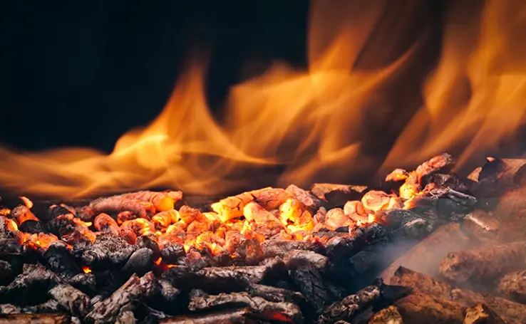 Burning biomass wood pellets, clean renewable biofuel for heating